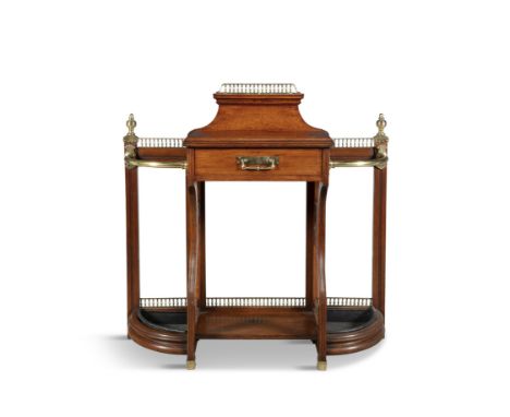 A VICTORIAN MAHOGANY BRASS MOUNTED STICK STAND, by James Shoolbred &amp; Co., with single frieze drawer, stamped 'Shoolbred'.