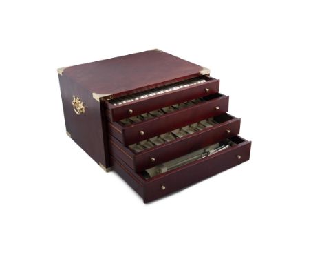 A 'CELTIC PATTERN' NEWBRIDGE CANTEEN OF SILVER CUTLERY,in a simulated mahogany case, comprising 24 knives with steel blades, 