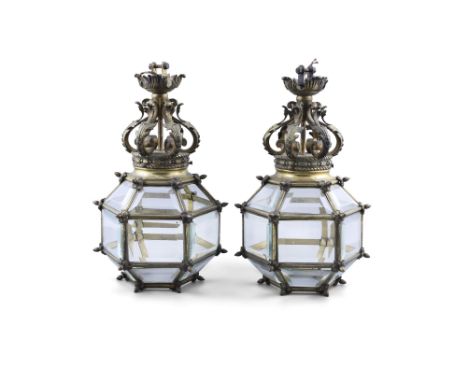 A PAIR OF FRENCH GILT BRONZE HALL LANTERNS, 19th Century of hexagonal shape, fitted with multiple bevelled glass plates separ