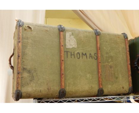 A canvas wood bound trunk bearing various labels, to include "Nelson Line" together with another similar trunk (2) 