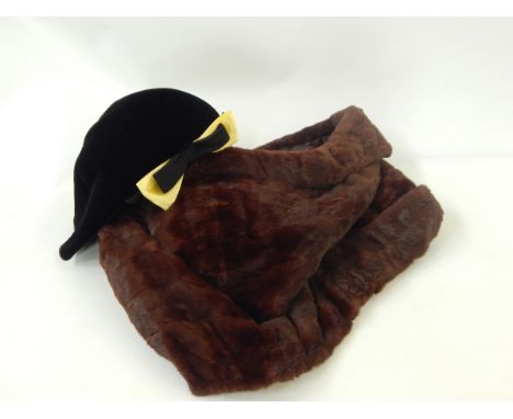 A black velvet vintage hat labelled "Marcelle Georges, 48 Rue de Paradis, Paris", made in France, black velvet with a petersh