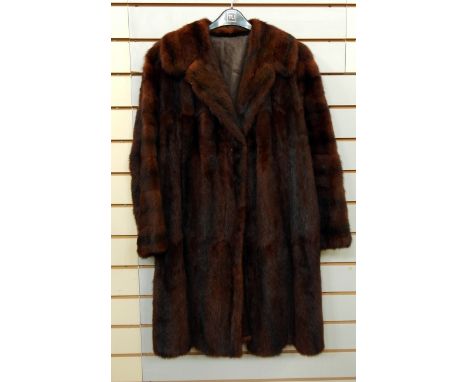 A vintage musquash coat, a vintage fur coat labelled "The National Fur Company", a vintage mink stole with tail fringe, two o