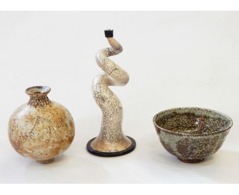 Two various items of studio pottery to include flared rim bowl with green and white raku-type glaze, on carved hardwood stand