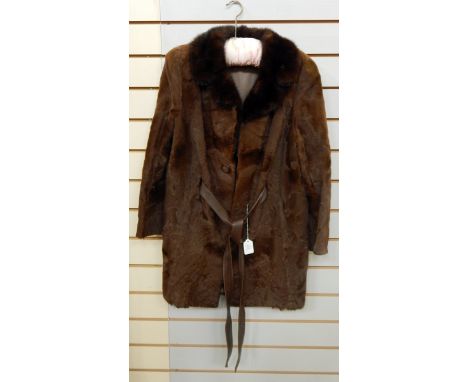 A 1970's goatskin brown leather and mink collar three-quarter length coat with leather tie belt 