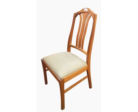 A set of modern light mahogany framed dining chairs 