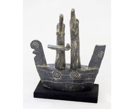 John Maltby (b.1936)
Studio stoneware figure group of man, woman and child aboard boat of stylised viking design, with geomet