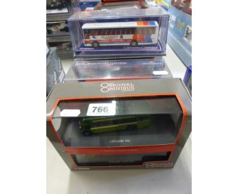 Four cased 1:76 Corgi Original Omnibus vehicles including 97057 Southdown 2 item set, 40307 Focus on Wales, 43101 Leyland Lyn