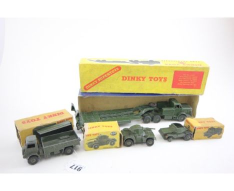 Four boxed Dinky Military vehicles including 660 Tank Transporter, 673 Scout Car, 670 Armoured Car and 623 Army Covered Vehic