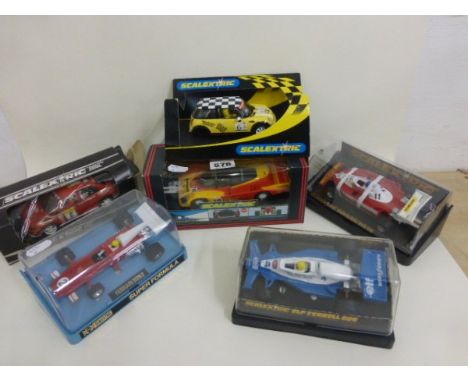 Six boxed/cased Scalextric slot cars including C025 Super Formula Ferrari 312, C135 Elf Terrell, C436 Porsche 962, C136 Ferra