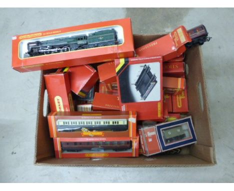 Box of boxed OO gauge model railway items including Hornby R552 Oliver Cromwell Locomotive, R189 Brick Bridge, numerous rolli