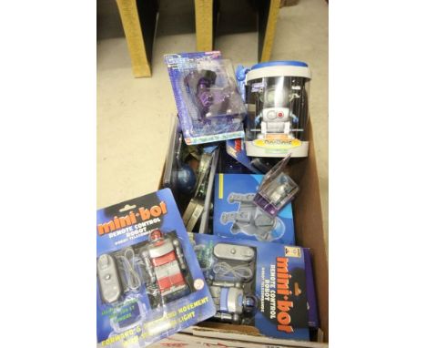 Approximately 15 carded/boxed plastic robot dogs plus two robot mice and two remote control mini-bots       