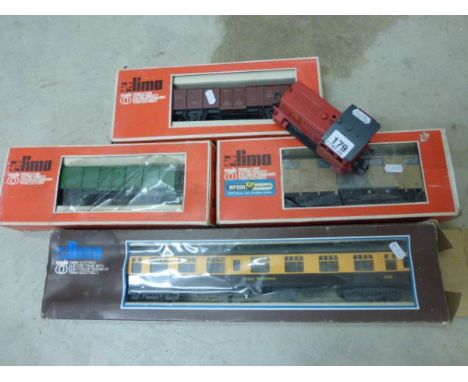 Four Boxed Lima O Scale Items of Rolling Stock Including 6620 Coach, 6722 Fiat Wagon, 6721 and 6742 plus a Lima Engine in Red