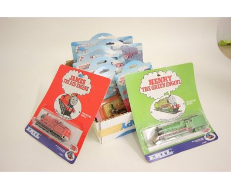 Nine carded ERTL Thomas the Tank Engine die cast trains including James, Oliver, Douglas, Henry, Peter, Sam, Rheneas, Duncan,