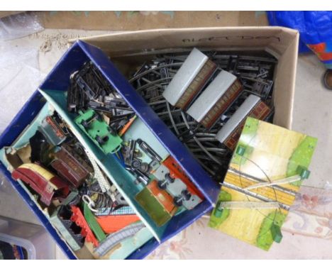 Box of Hornby O gauge rolling stock, engine parts, signals. Level crossing plus three LMS coaches and a quantity of track    