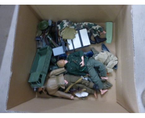 Box of mainly vintage Action Man accessories including two dolls, weapon, clothing etc