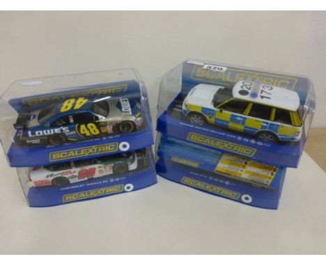 4 Boxed Scalextric Cars  Including Range Rover Police Car, Chevrolet Impala SS x 2 and Audi RIO