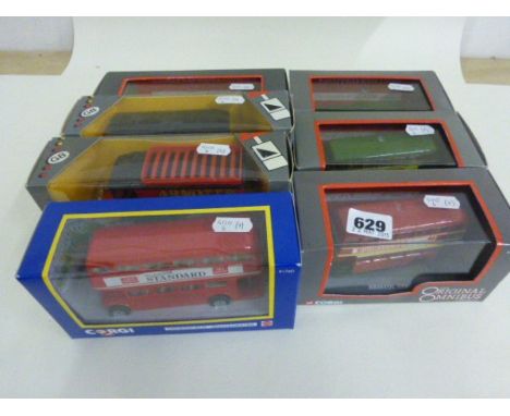 7 boxed Corgi commercial vehicles including 2 Thornycroft vans, 4 buses and a London Routemaster bus