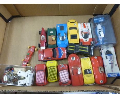 16 Scalextric slot cars including Tyrrell in case, C17 Lamborghini in yellow, Circuit 24 (French) in red etc             