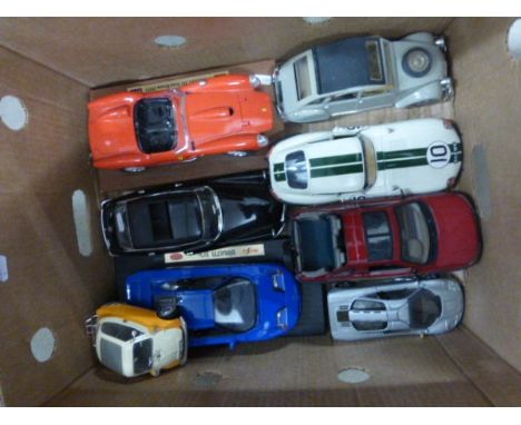 8 Die Cast Vehicles, Mostly 1:18 Scale, Including Solido Citroen 2CV, Burago Jaguar E-Type, Maisto Bugatti EB110 and Ertl Lan