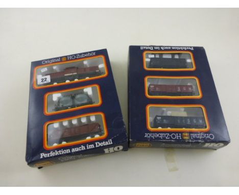 Two boxed HO Piko model railway 3-piece sets including 0723 with engine and two 4-wheel wagons and three wagon set both origi