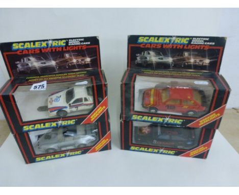 4 Boxed Scalextric Cars with Lights Including  Martim Lancia, Ford XR3i, Ford Sierra and Porsche 911