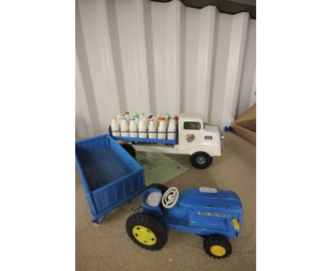 Tin plate made in Japan Farm Tractor with Cargo Trailer and a tin plate Triang Milk Float complete with plastic bottles