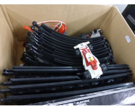 Box of loose Scalextric items including Cars, Controllers, Track and Transformer