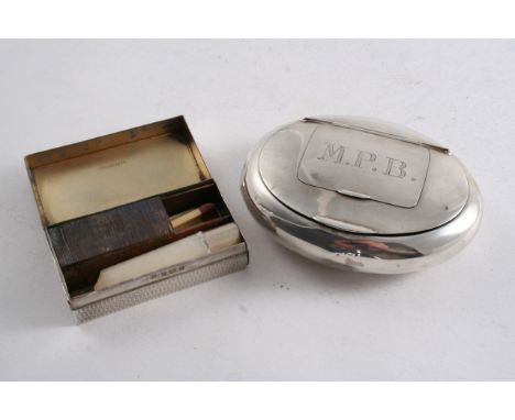 AN ENGINE-TURNED PATENT "GO TO BED" BOX with a hinged cover, hinged end with later added socket, vesta compartment, vacant ca