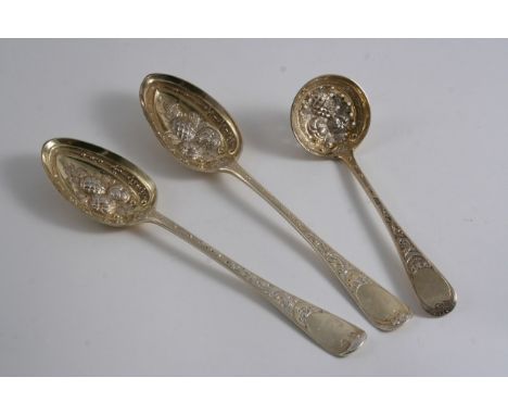 A PAIR OF EDWARDIAN SILVERGILT FRUIT SERVING SPOONS  & matching sugar sifter ladle with chased & embossed decoration & vacant