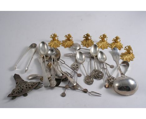 A MIXED LOT: A set of six gilt metal "crest" menu card holders, a plated menu stand and a quantity of flatware (including an 