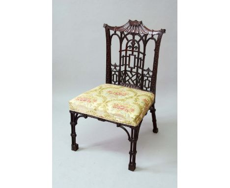 A PAIR OF GEORGE III STYLE CHINESE CHIPPENDALE MAHOGANY SIDE CHAIRS each back with a pagoda top and blind fret carved upright