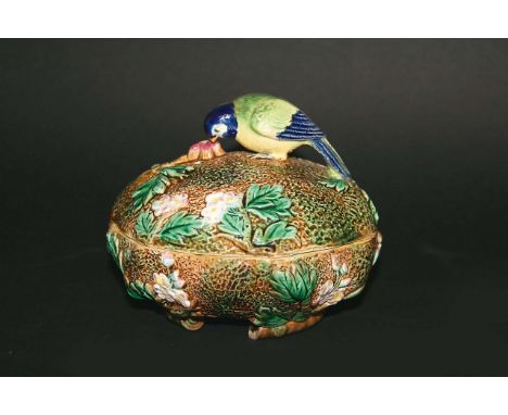 GEORGE JONES MAJOLICA BOX & COVER an interesting box with a Bird as the finial, moulded with flowers and foliage on a mossy g