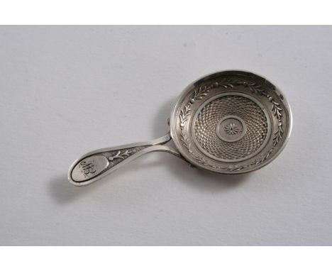 A GEORGE III CADDY SPOON resembling a frying pan with stamped decoration & a bifurcated handle, initialled "EW", no apparent 