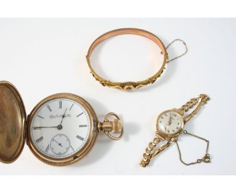 A LADY'S 9CT. GOLD WRISTWATCH BY ROAMER the signed circular dial with Arabic numerals and subsidiary seconds dial, on a gold 