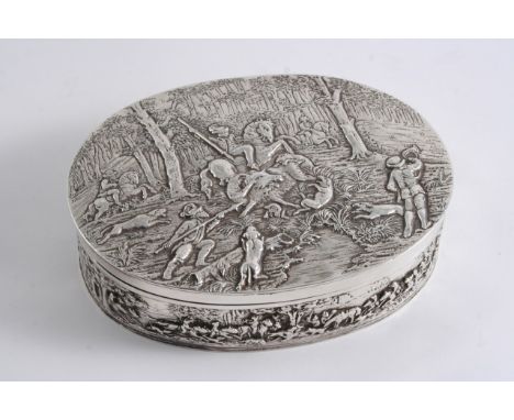A CONTINENTAL EMBOSSED OVAL BOX with stag hunting scenes around the sides and a hinged cover depicting a boar hunt, with Engl