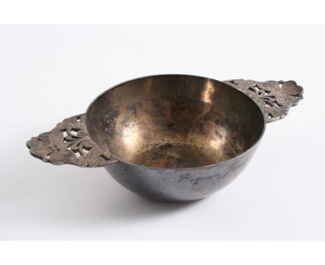 A MODERN DISH with a circular bowl, the handles pierced & engraved with clover leaves, inscribed around the rim "From R. Mass