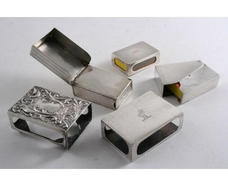 A "DUNHILL'S DESIGN" MATCH BOX HOLDER by S. Mordan & Co., London 1915, three other various match box holders and an engine-tu