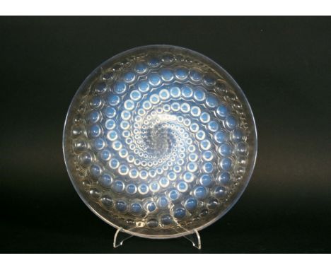 LALIQUE PLATE an opalescent plate in the Volutes design, marked R Lalique, France. 10 3/4ins (27cms) diameter