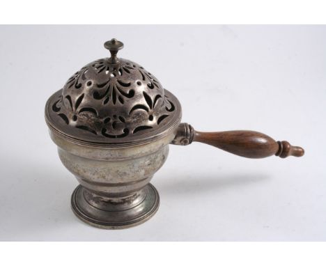 AN EARLY 19TH CENTURY PORTUGUESE BRAZIER with reeded borders, a turned wooden handle & a hinged, domed cover with piercing & 