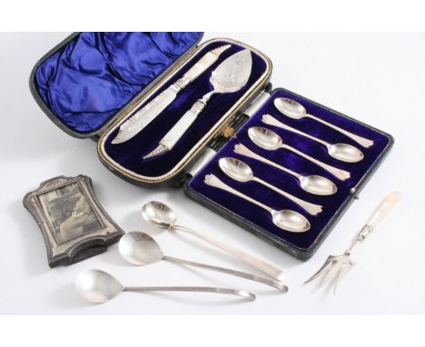 A MIXED LOT: A cased set of six modern "Trefid" tea spoons, a small engraved fork with a mother of pearl handle, three small 