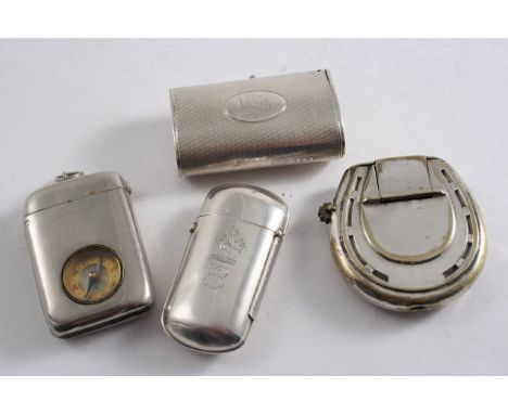 A VICTORIAN OVAL TUBULAR VESTA CASE with engine-turning & a suspensory ring, crested, by William Summers, London 1874, anothe