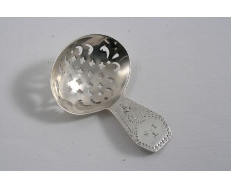 A GEORGE III DOUBLE-DUTY CADDY SPOON with a bright-cut, coffin-end, initialled & a pierced bowl, by D. Urquhart & N. Hart, Lo