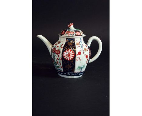 A FIRST PERIOD WORCESTER JAPAN PATTERN TEAPOT AND COVER with a fluted body, blue squre trellis mark, 4 1/2ins. (11.5cms.) wid