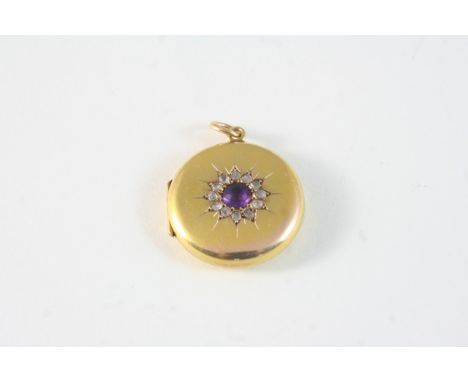 A VICTORAN AMETHYST, DIAMOND AND GOLD LOCKET PENDANT of circular shape, set with a circular-cut amethyst within a surround of
