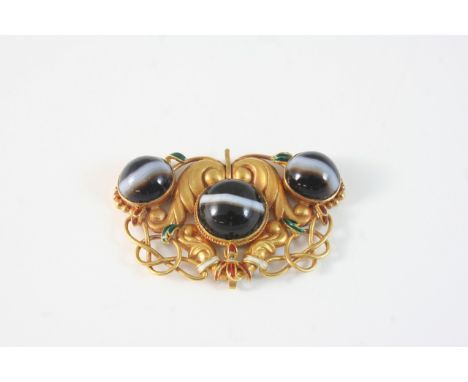 A BANDED AGATE PENDANT set with three circular banded agates, within a gold scrolling mount with enamel decoration, 5.5cm. wi