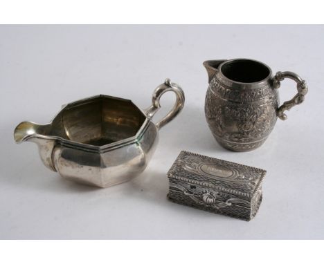 A MIXED LOT: A Russian squat, octagonal cream jug, Moscow 1866, an Indian barrel-shaped cream jug with chased decoration, unm