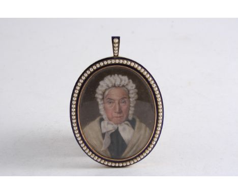 A GOLD FRAME for a miniature portrait with pearl and blue enamel border; sight size 7.25 x 5.75 cms, early 19th century, set 