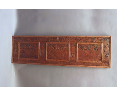 A 17TH CENTURY NORTH ITALIAN CYPRESS COFFER FRONT the panels inked and incised with hunting scenes, subsidiary niches of figu