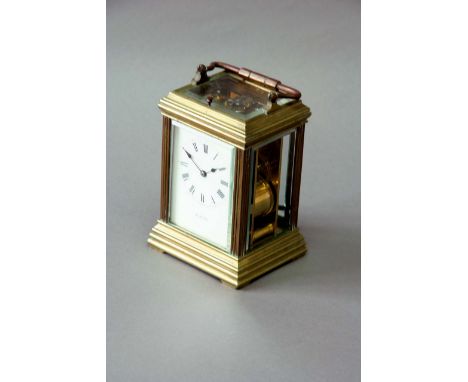 A CARRIAGE CLOCK dial white enamel, signed Clarke, movement repeating, lever escapement, striking on a gong, case moulded, 6 