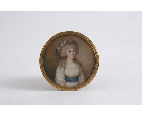 FRENCH SCHOOL LATE 18TH CENTURY A miniature portrait of a lady, a wreath of flowers in her hair, half length on ivory;  6 cms